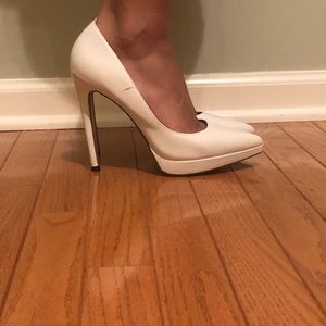 White pointed toe heels